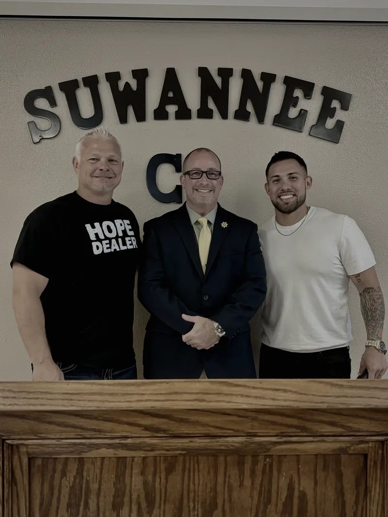 Frank Ortega and the MOG team with the Warden of Suwannee Correctional Institution in Florida